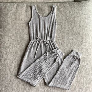 Cozy grey jumpsuit. Perfect for travel! Size small. Caution to the wind brand